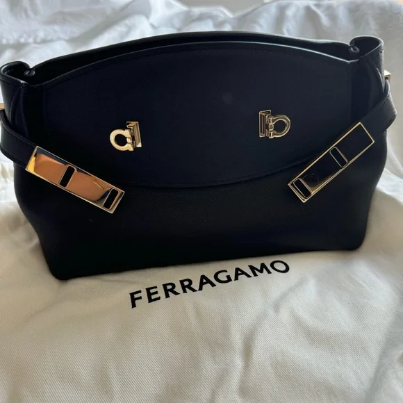 Ferragamo Hug Pouch bag in black and gold hardware - Picture 8 of 11